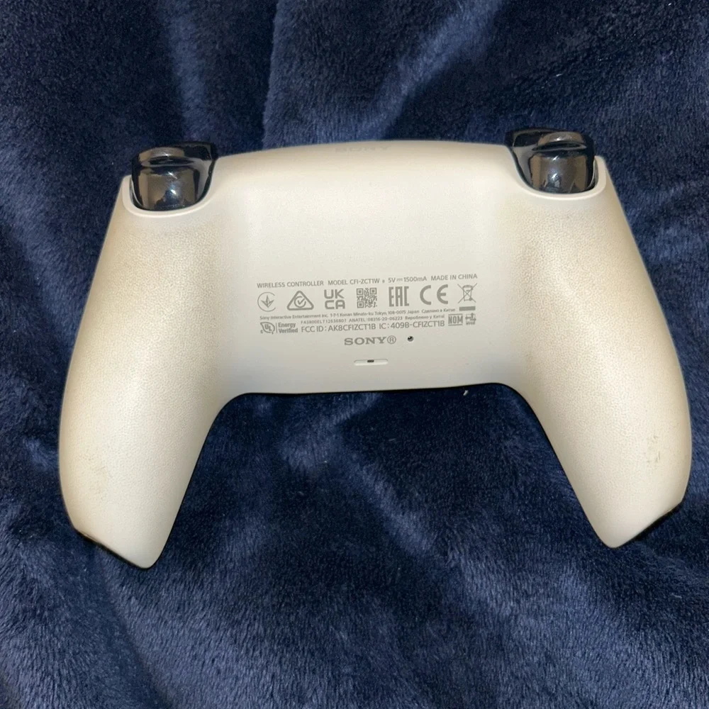 White PS5 Gaming System with White Controller